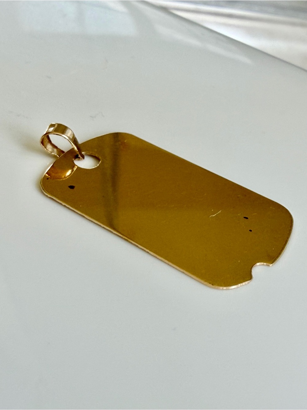 14 karat gold dog tag